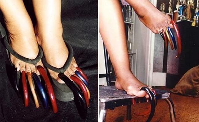Луиза Холлис носит самые длинные ногти на ногах